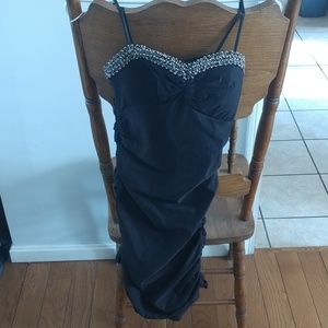 A black strapless dress